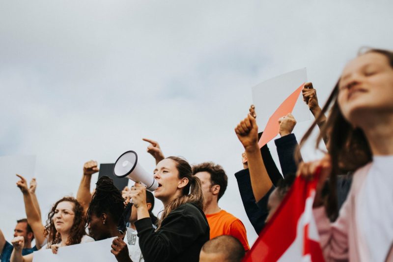 A group of youth protesting as a powerful act of civic engagement beyond the ballot