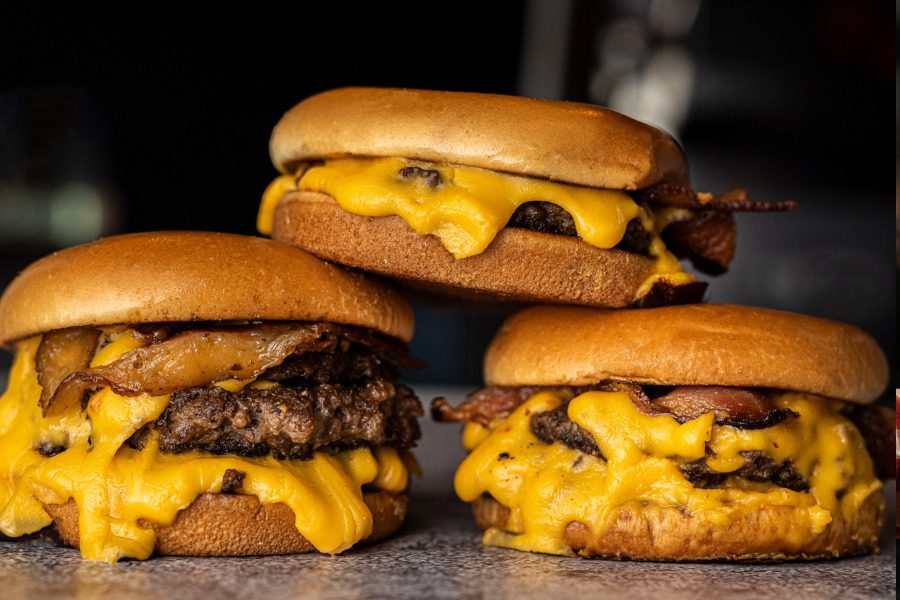 A pile of smash burgers.