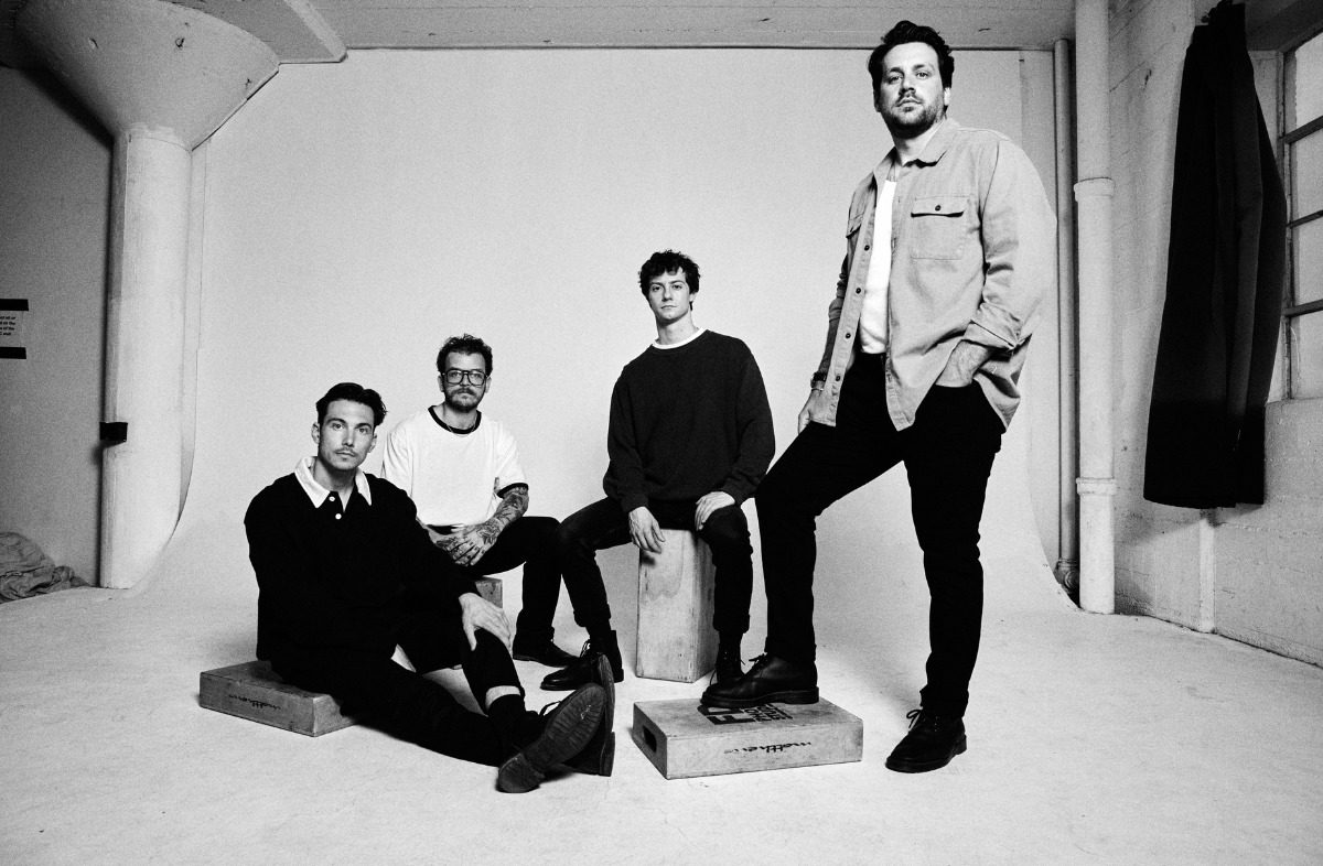 Black and white photo of the band Grayscale.