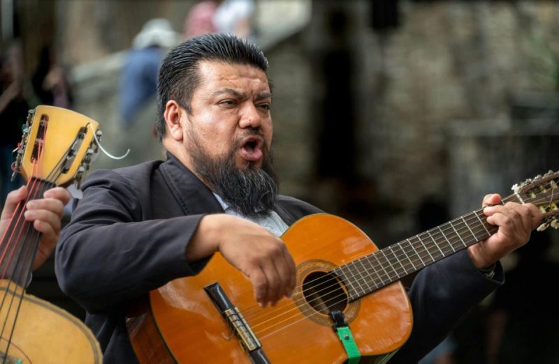 man performs mariachi music