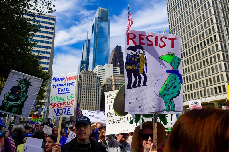 People participate in a "No Kings" national day of protest in Philadelphia, Pennsylvania, on October 18, 2025. From New York to San Francisco, millions of Americans are expected to hit the streets to voice their anger over President Donald Trump's policies at nationwide "No Kings" protests. US-POLITICS-PROTEST